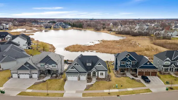 13175 Coral Sea Ct NE, Blaine, MN: Luxury Home in Wagamon Ranch with Pond Views and Resort-Style Living