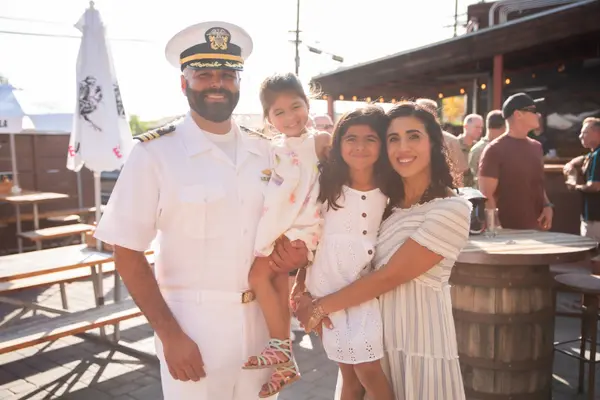 Shirin Kheshti, San Diego military relocation Realtor and Navy spouse, with her family
