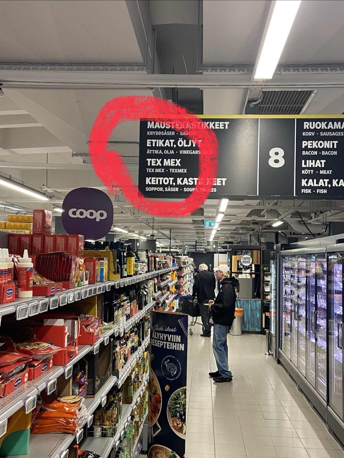 Tex-Mex aisle sign in a Helsinki grocery store circled in red