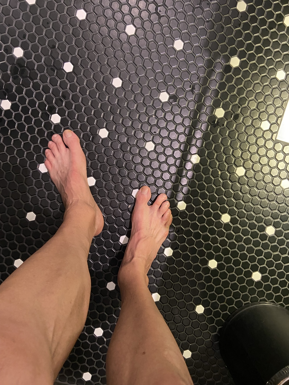 heated bathroom floor with hexagonal tiles