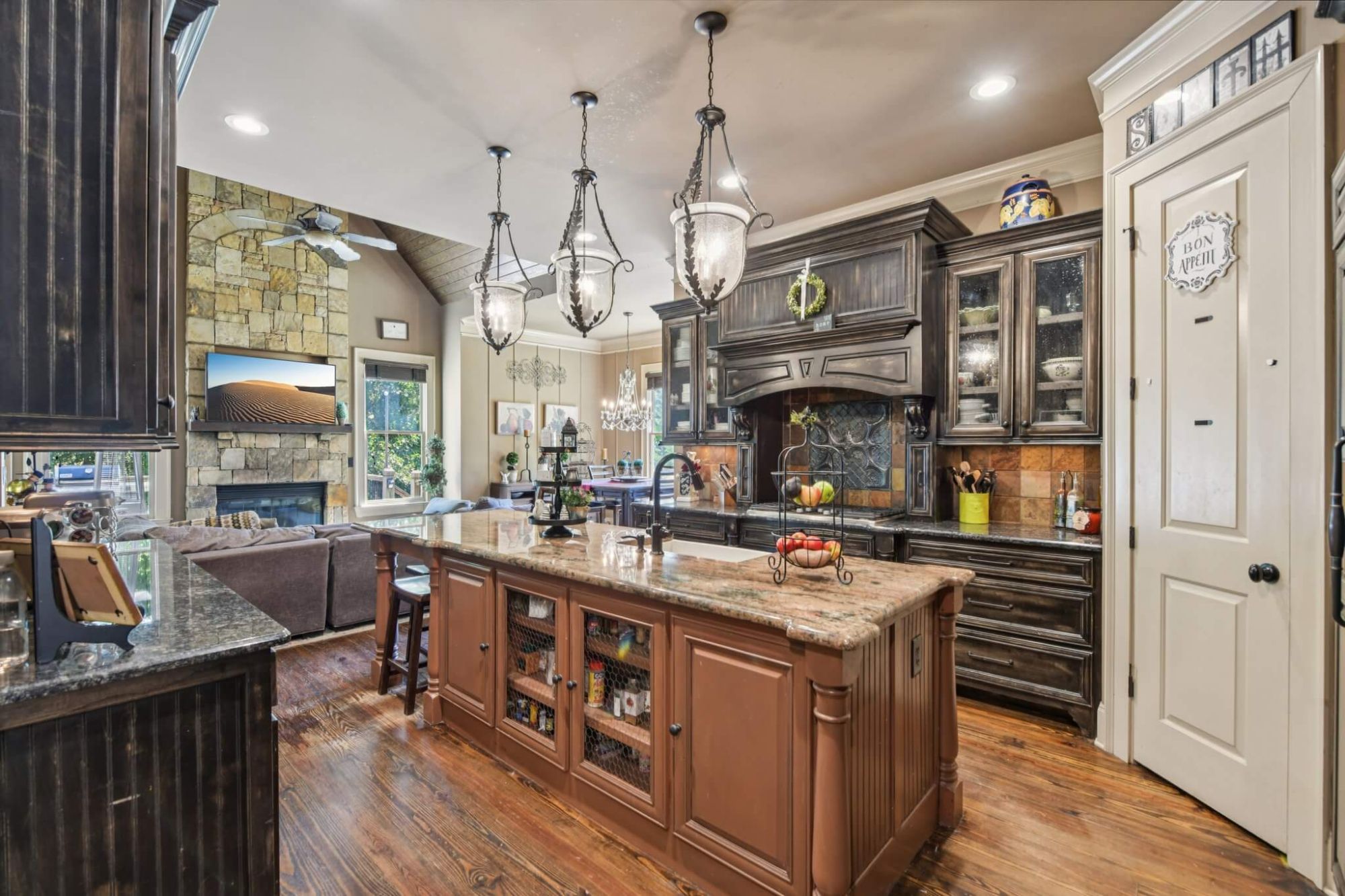 Open concept kitchen and living room in Marina Bay home