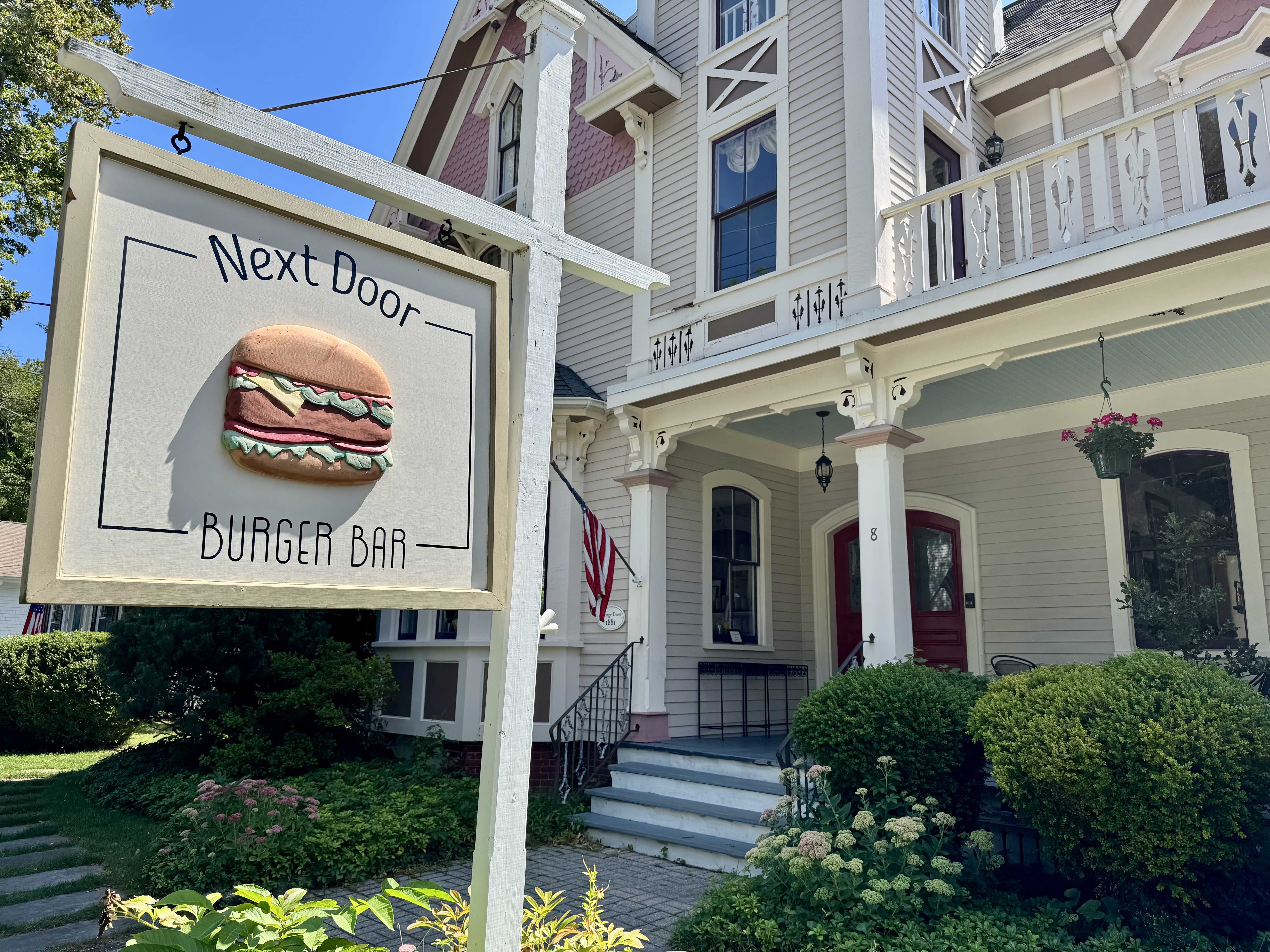 Next Door Burger Bar elevates the classic American burger experience