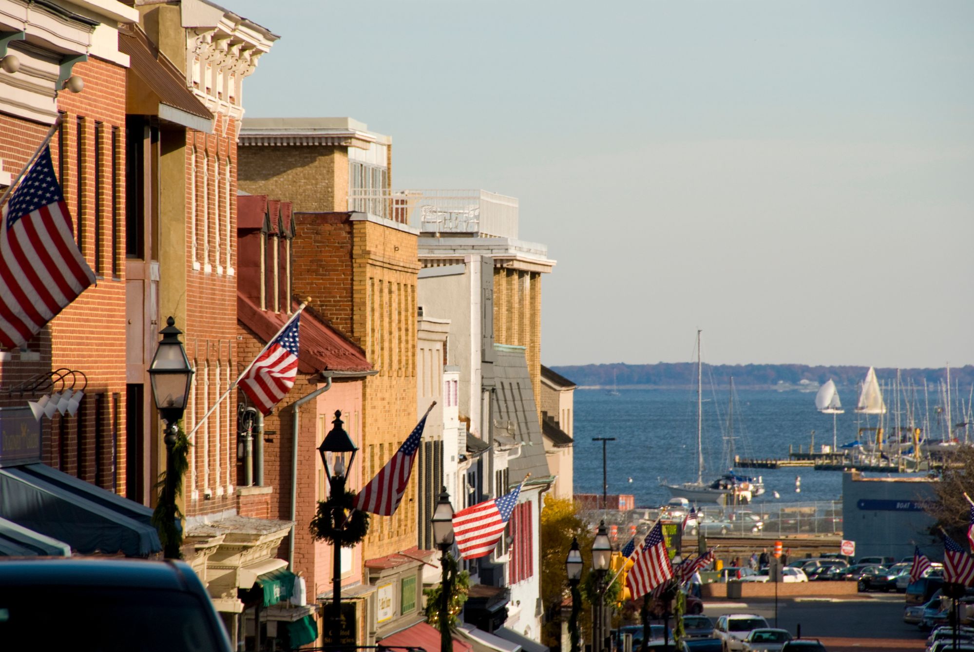 Main Street in downtown Annapolis with historic storefronts and Chesapeake Bay views