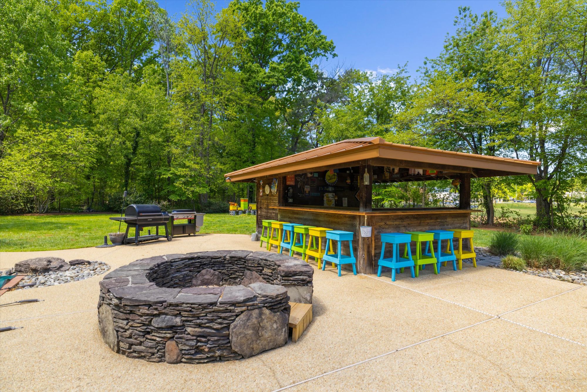 Custom fire pit and outdoor entertaining area at 470 Jumpers Hole Road