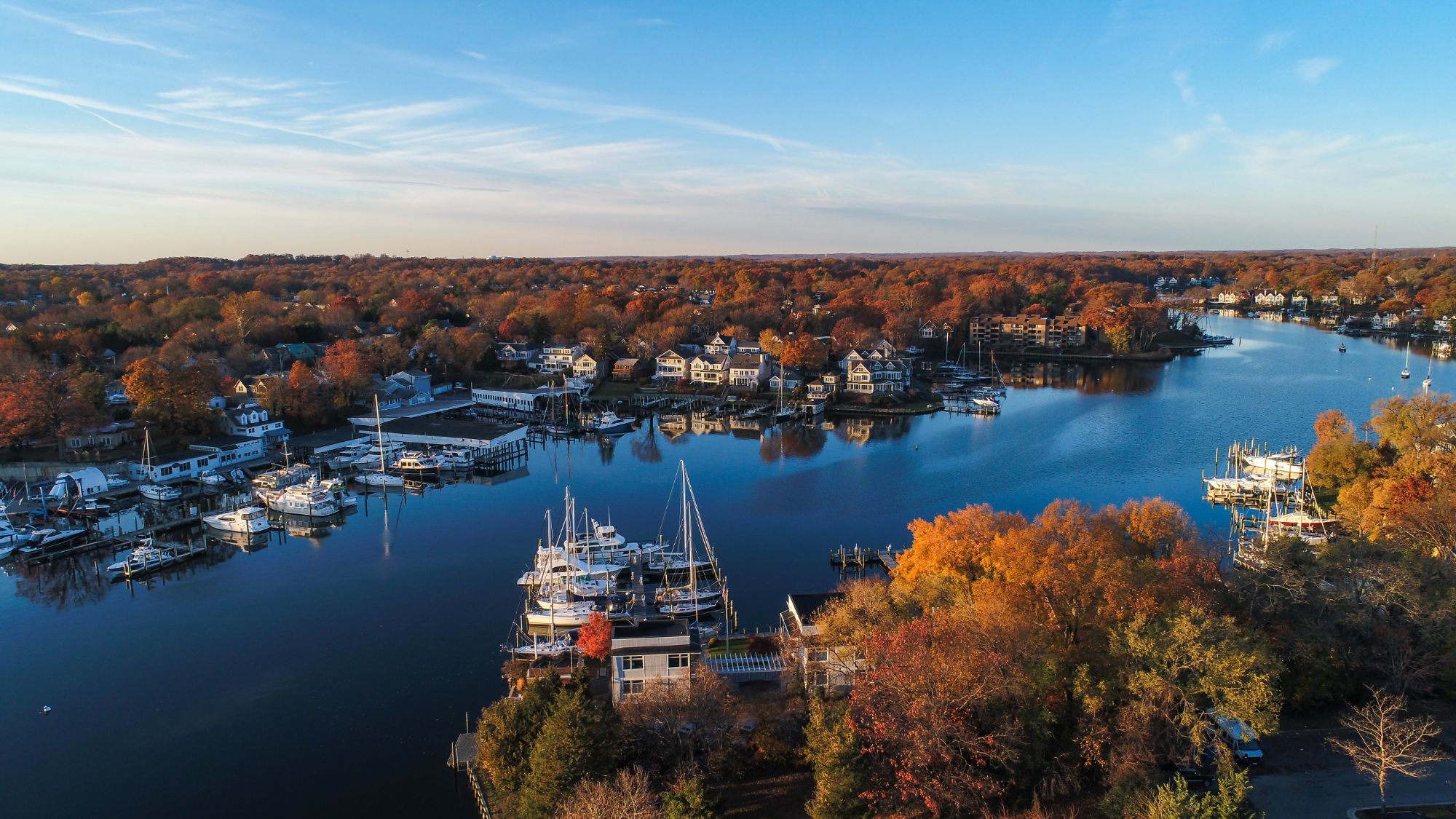 "Aerial view of waterfront homes in Annapolis, MD, showcasing the local real estate market for prospective home buyers.
