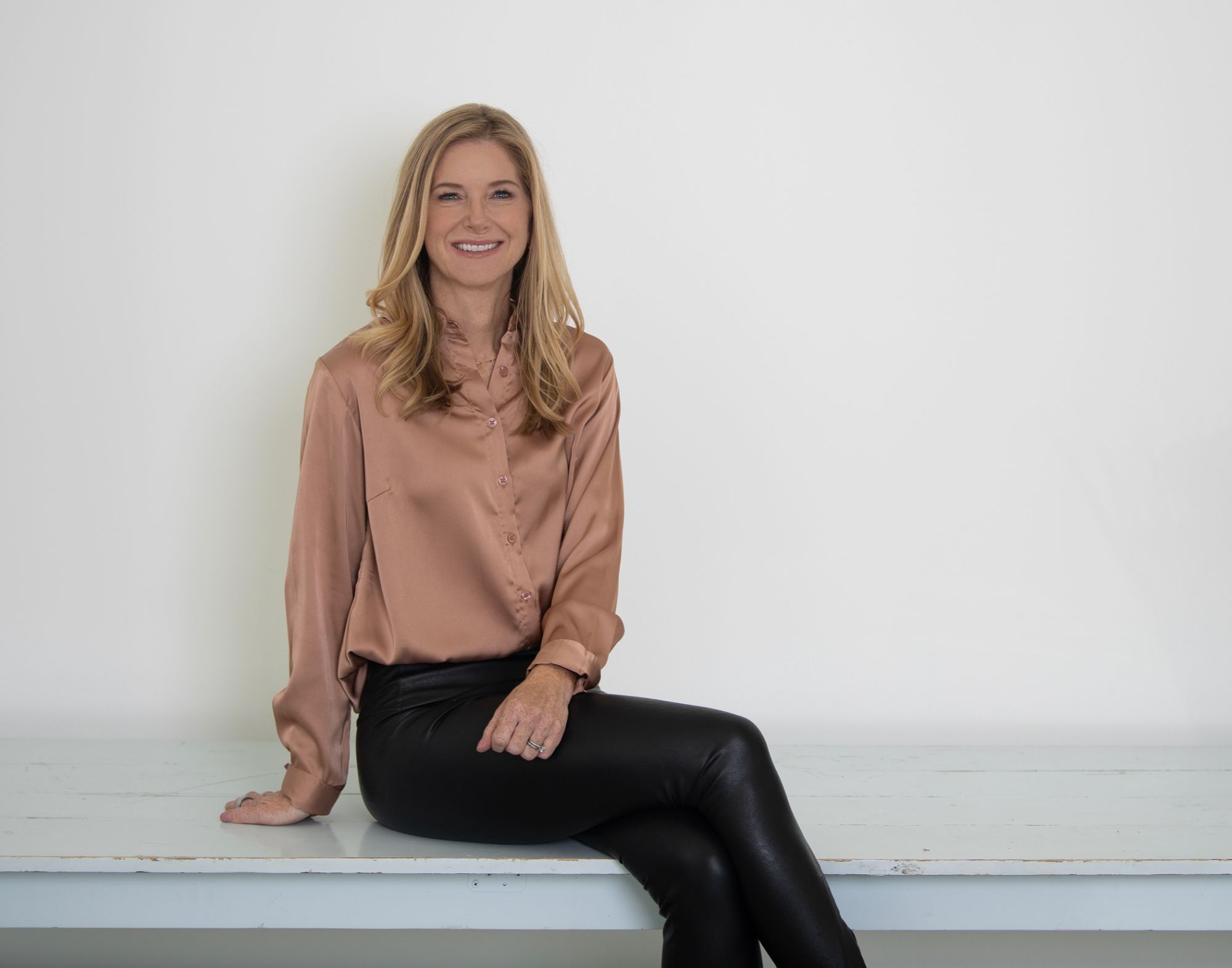 Portrait of Jen Holden, top real estate agent in Annapolis, MD, and founder of The Jen Holden Group at Compass.