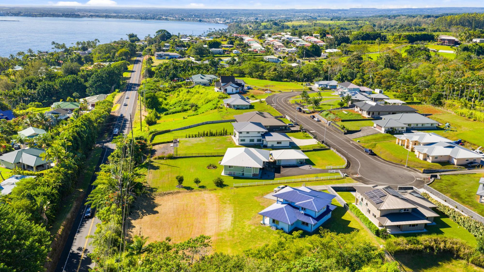 Aerial view of Honolii Ocean View Estates subdivision and coastline