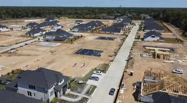 Are there any new residential developments in The Woodlands available for purchase?,Julian Schwertz