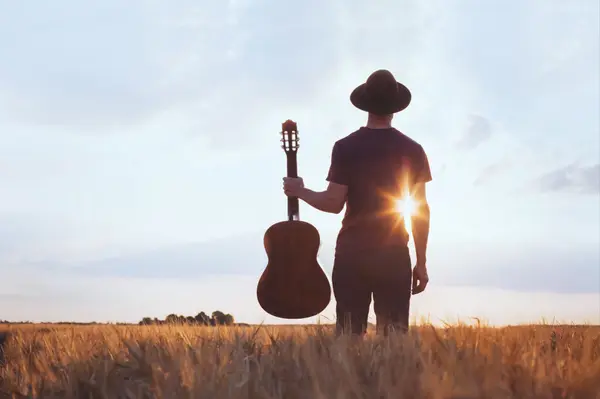 Guitar cowboy boots lasso AdobeStock_132616247