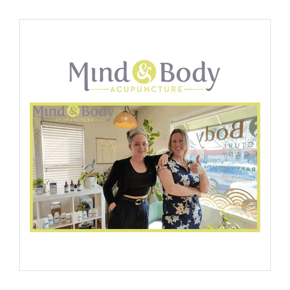 Mind & Body Acupuncture logo above Erica Docimo and Sarah Arlington in the Hillhurst studio
