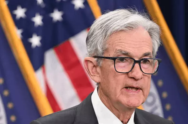 feature image of Powell Opens the Door to Rate Cuts—What It Means for Buyers &amp; Sellers