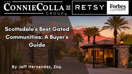 Scottsdale gated community entrance with stone gates, palms, and mountain views