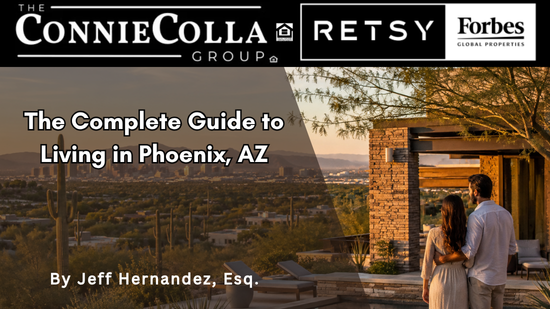 Couple overlooking Phoenix skyline and desert homes, showcasing living in Phoenix, AZ