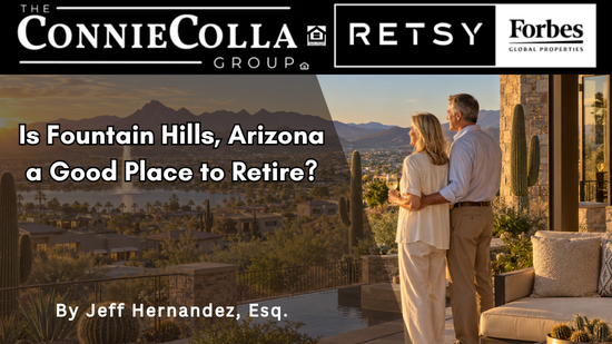Retired couple overlooking Fountain Hills, Arizona at sunset