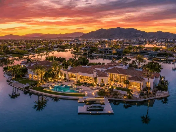 Scottsdale waterfront estate with private dock and lake views at sunset