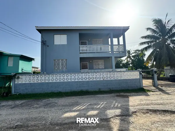 Income-Generating Duplex Steps from the Caribbean Sea — 6/Bed/4Baths Opportunity