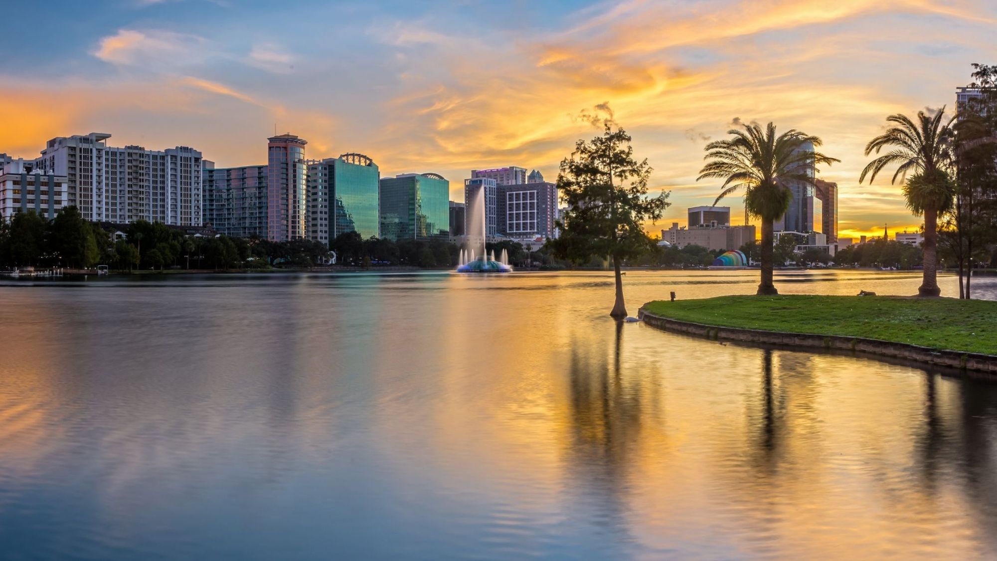 Downtown Orlando skyline symbolizing the thriving luxury real estate market for cash buyers.