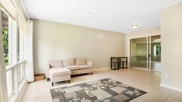 5651 Lido St, Orlando, FL 32807 - Living Room with peek into Family Room