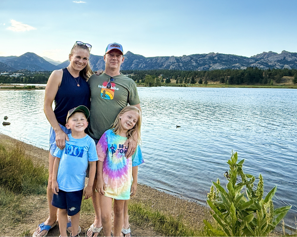 The Beitler real estate family business with their kids (Tiffany, Andrew, Addie and Finn) in front of mountains in Colorado.