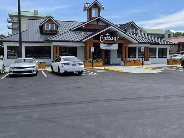 feature image of Discover the Charm of The Cottage in Pigeon Forge: A Perfect Spot for Brunch Before Your Real Estate Adventure