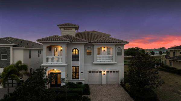 LUXURY MANSION ON A GOLF COURSE TAKEN AT TWILIGHT