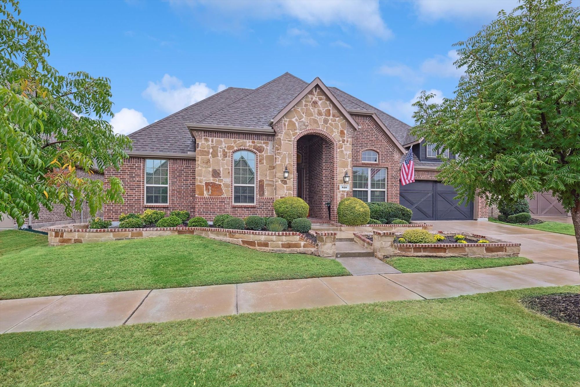 Front exterior of 820 Boardwalk Way Little Elm TX Union Park home for sale