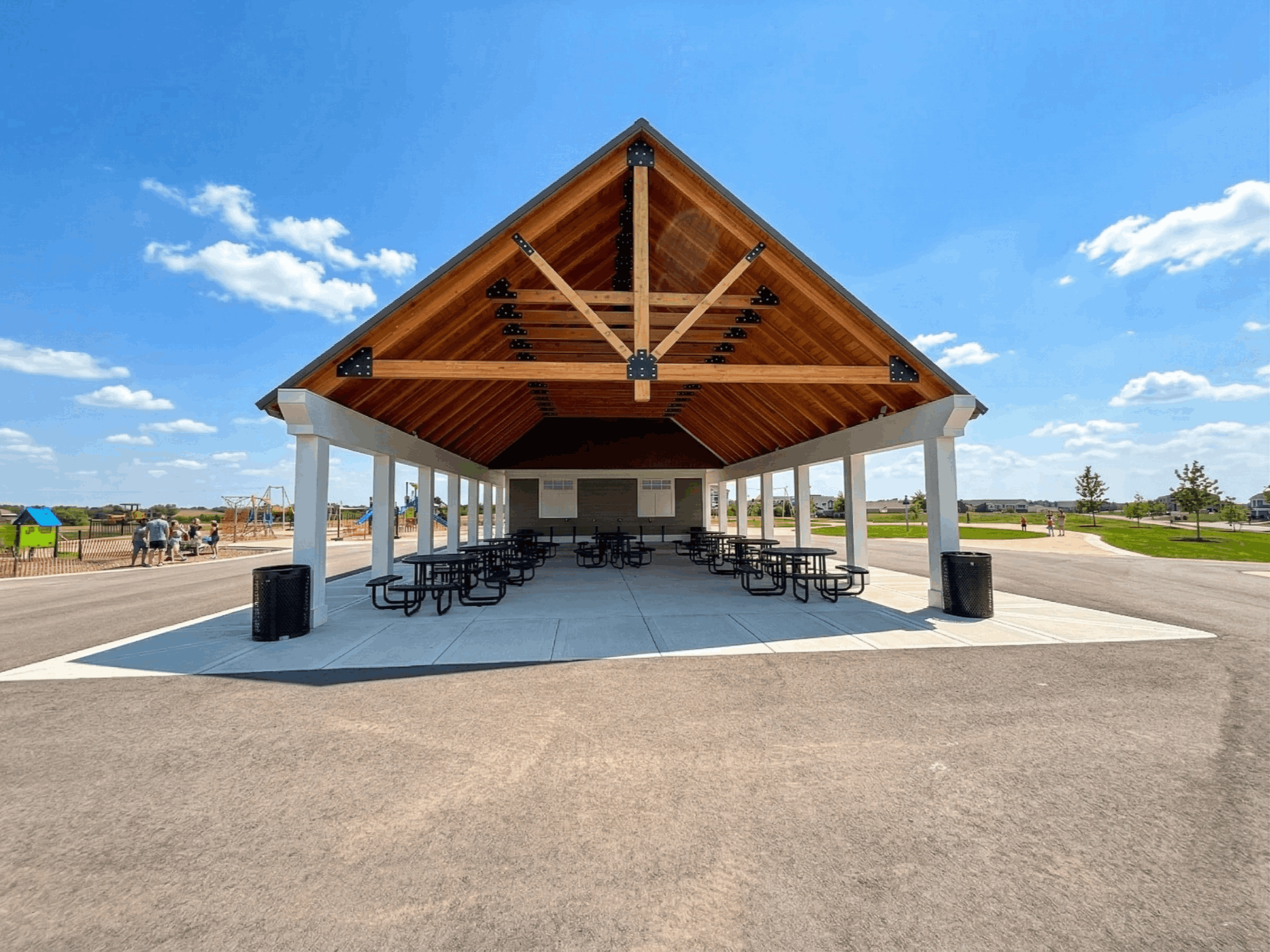 Kilkenny Farms West community pavilion with timber frame shelter and picnic tables in Waunakee Wisconsin