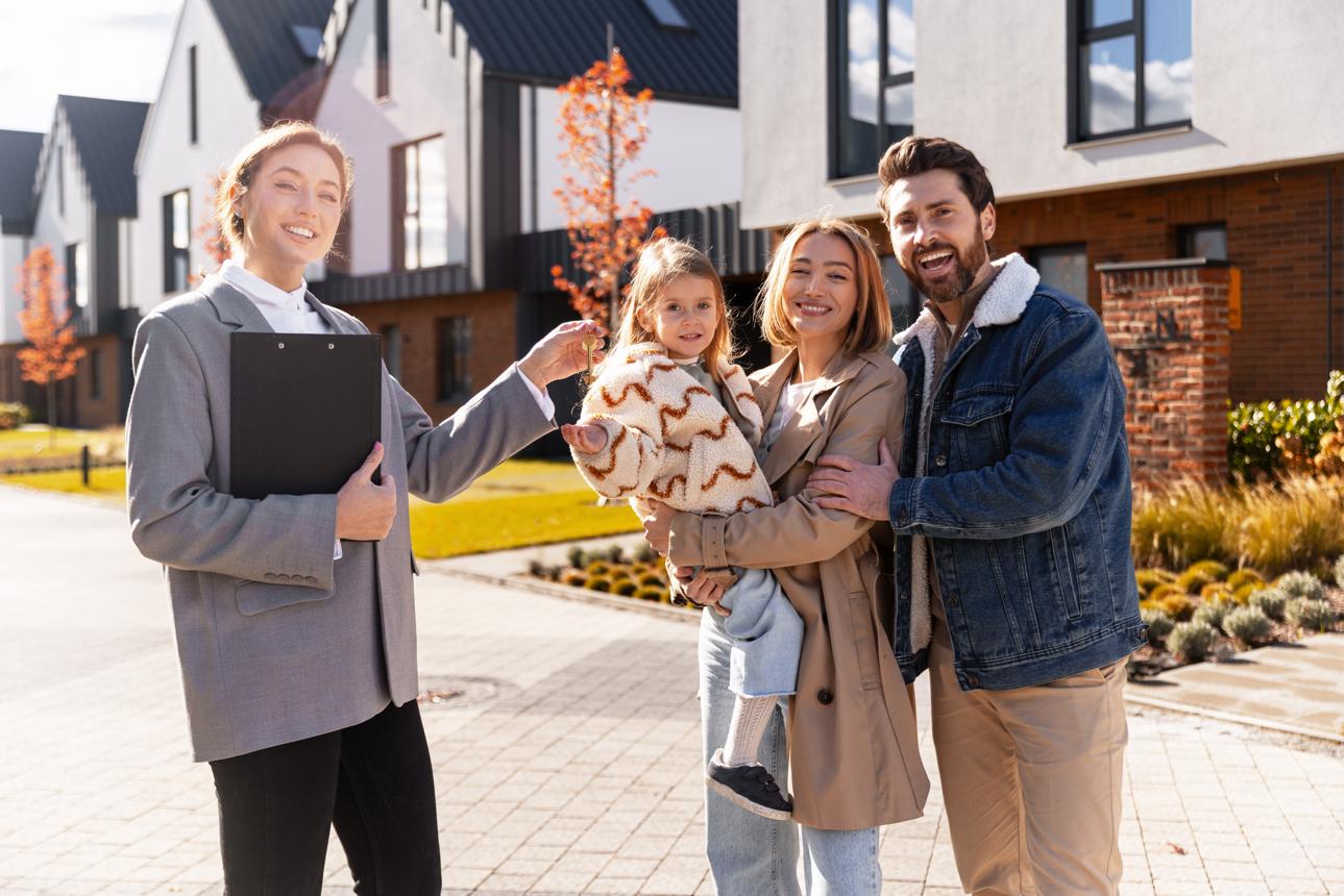 Real estate agent meeting with first-time home buyers in Central Alabama.