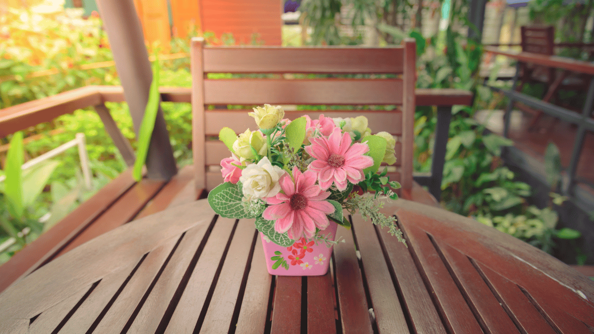 Fresh Flowers Brighten Up A Patio Table