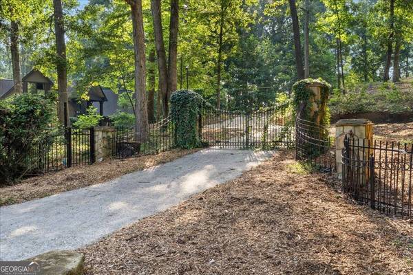 Stately Ivy Covered Gated Entry