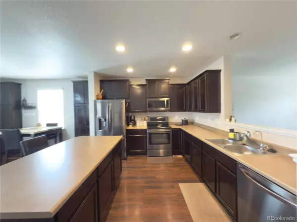 11590 River Oaks LN, Commerce City, CO 80640