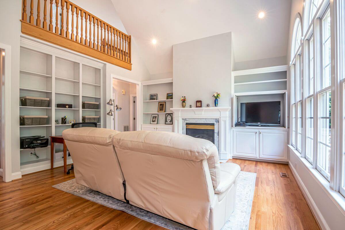 Bright open living room with large windows in a move-in ready home