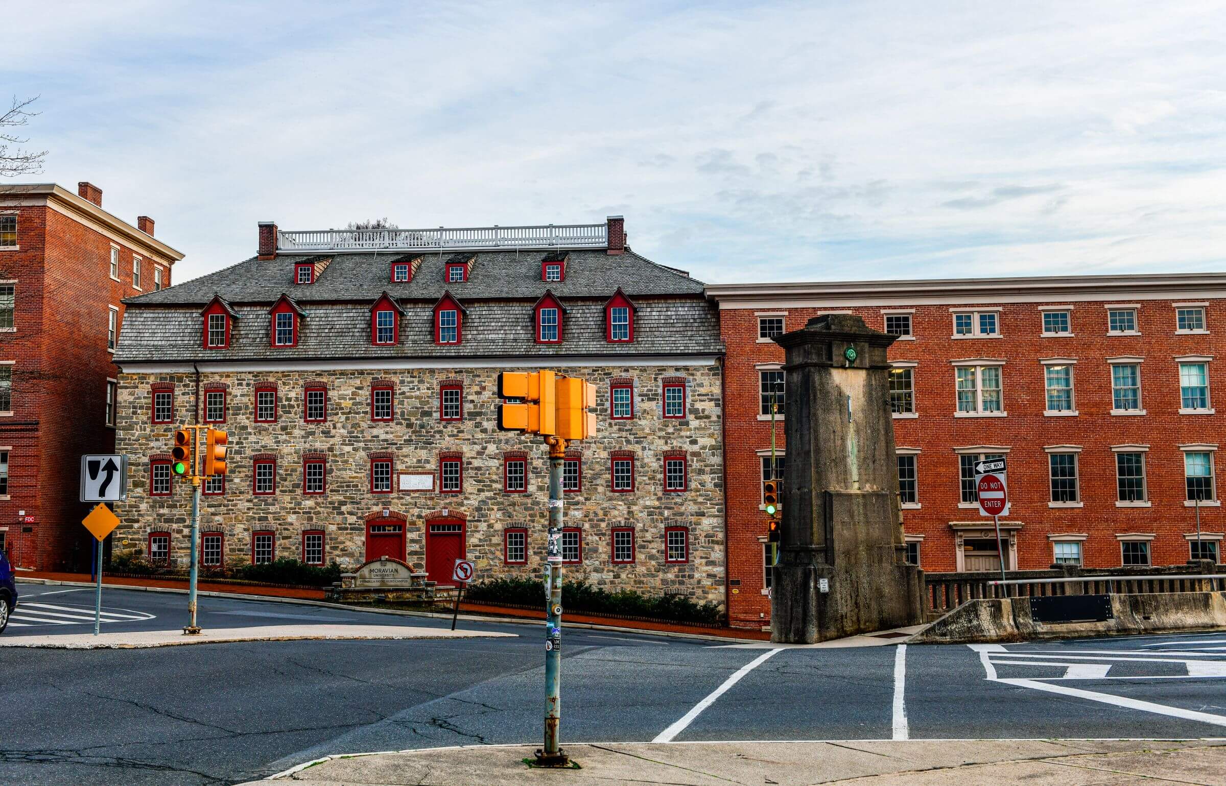 Historic stone and brick buildings on a street corner in Bethlehem, Pennsylvania