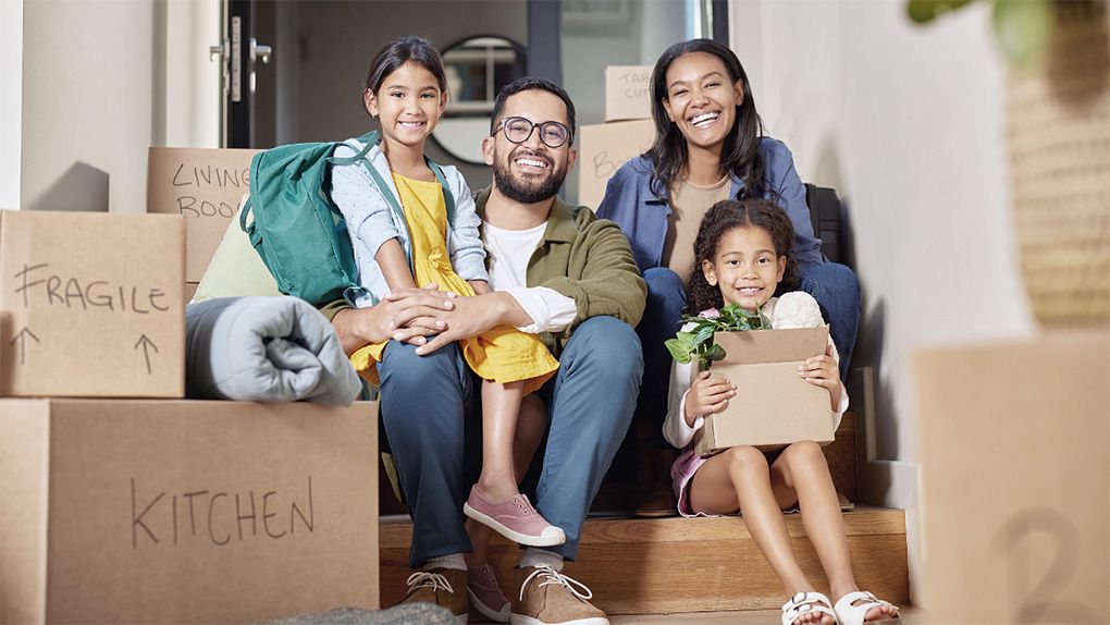 Family moving in to their a new home for sale in Davenport, Florida, neighborhood