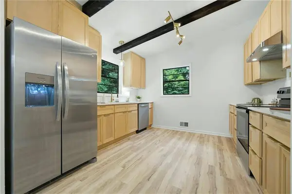 411 Hunters LN, Woodstock, GA 30189