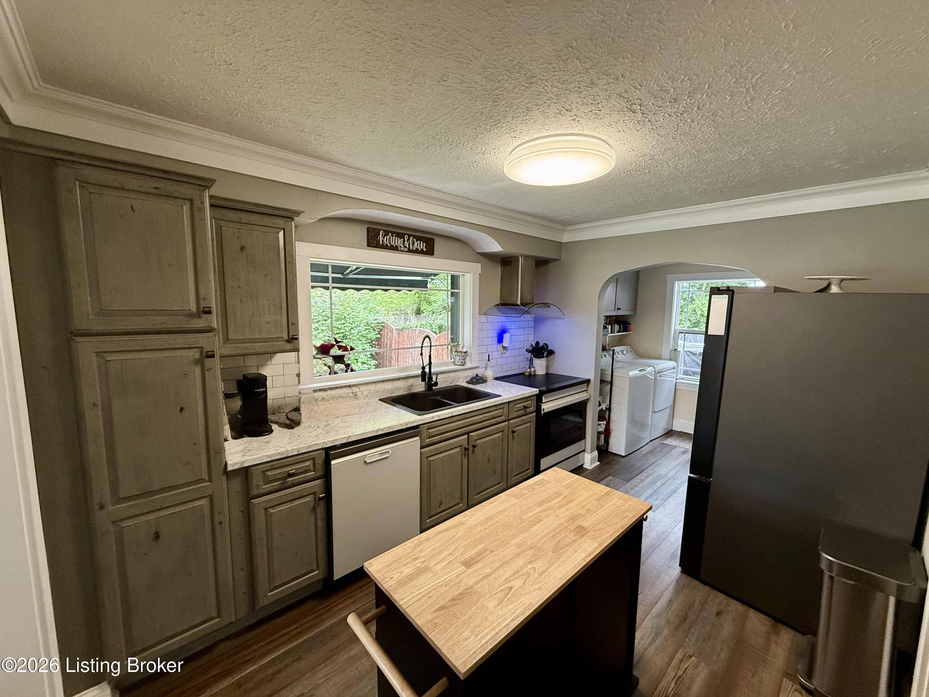 Kitchen layout with cabinetry in entry-level Bloomfield property