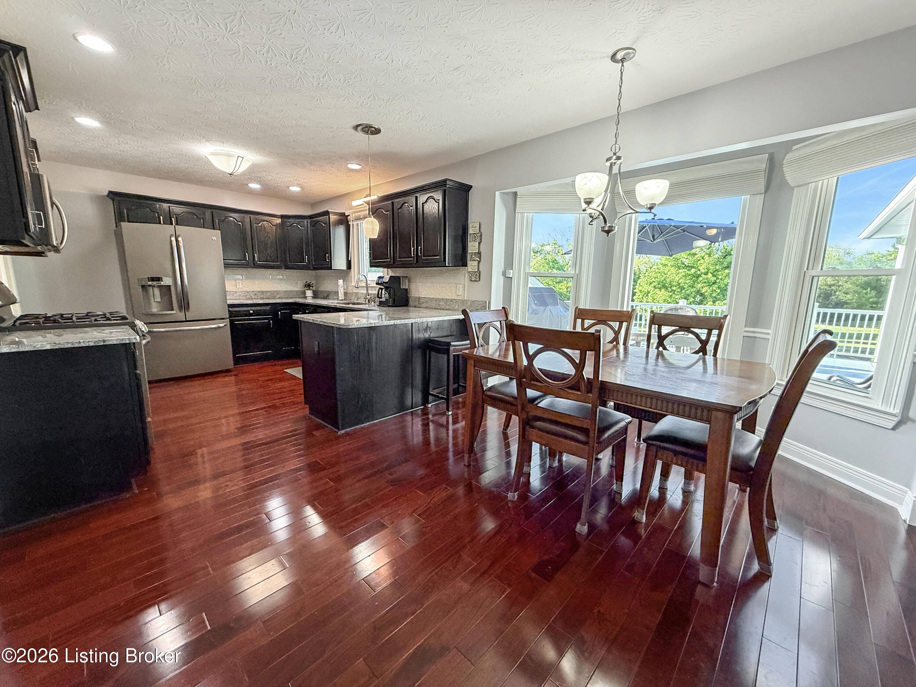 Kitchen layout with cabinetry and workspace in Stoney Ln property