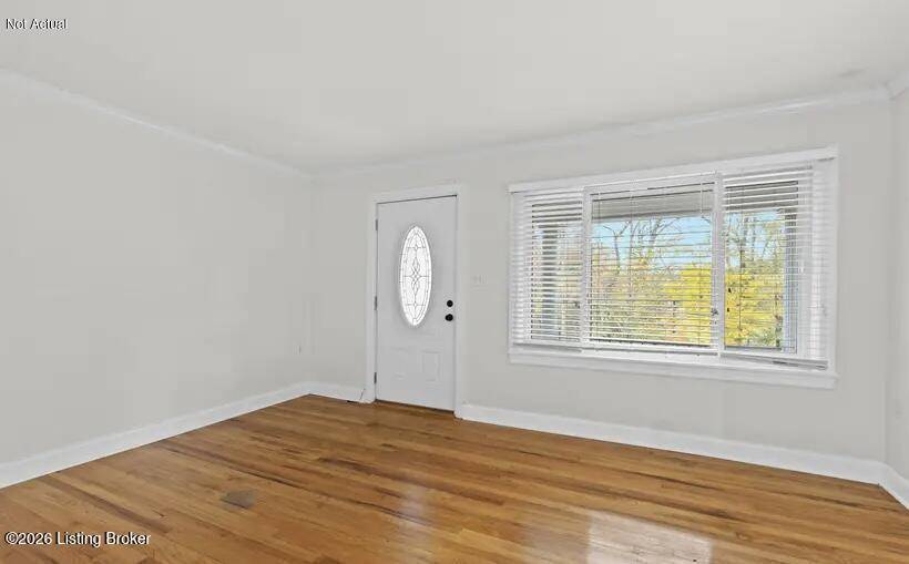 Living room with natural light in Louisville move-in ready home