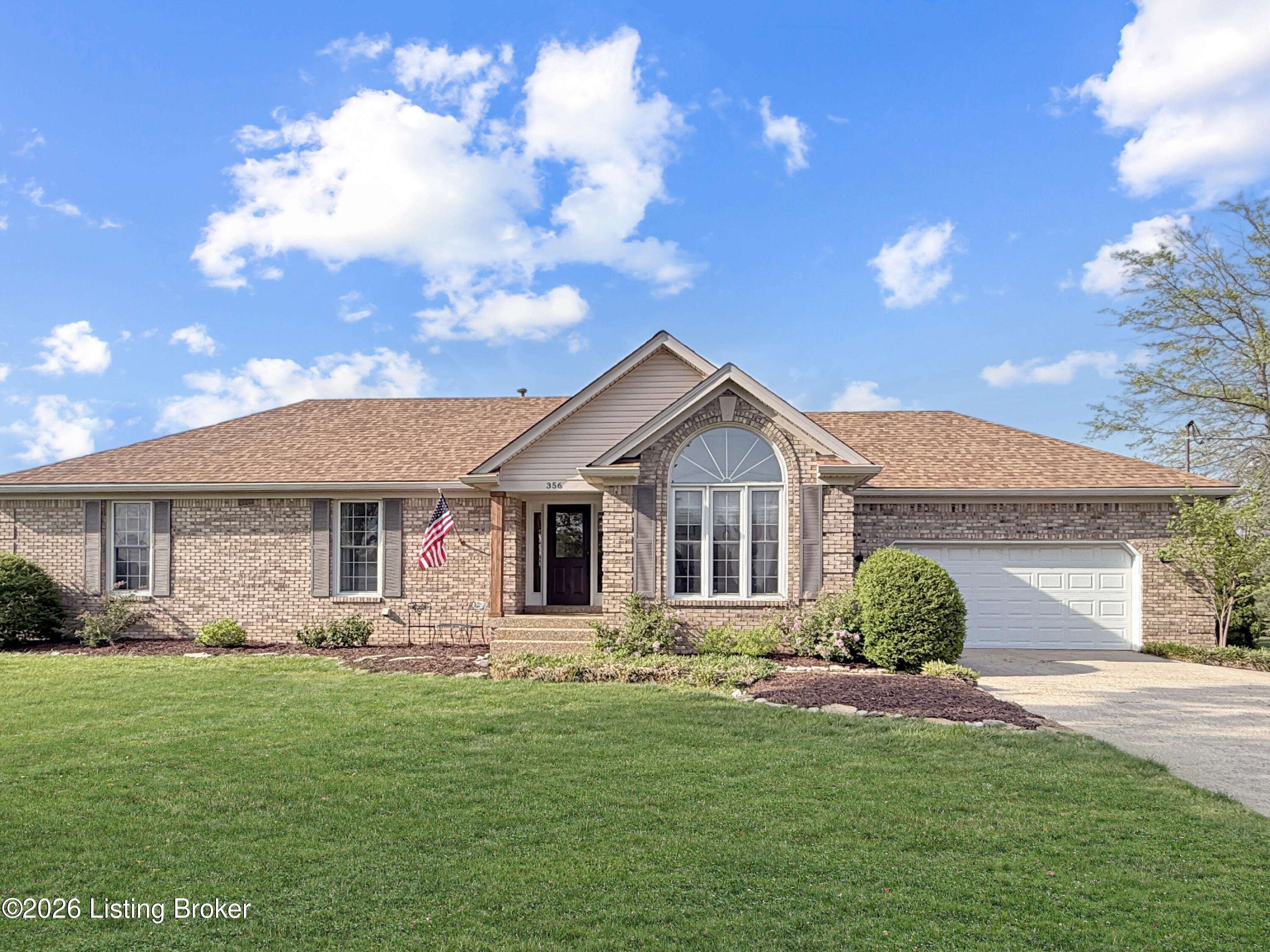Front exterior of home in Shepherdsville KY with attached garage
