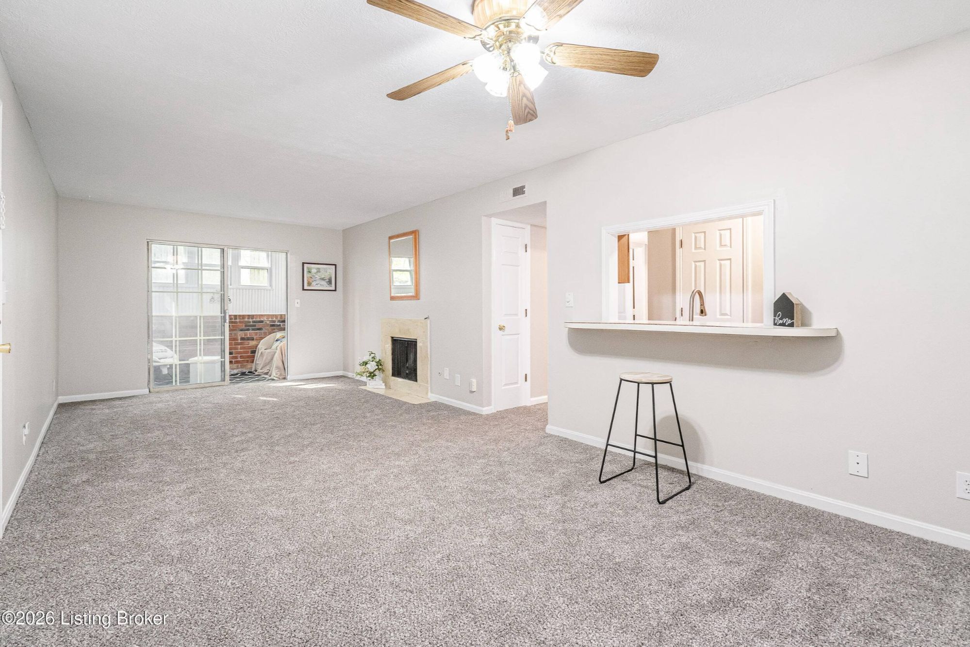 Living room with fireplace in Louisville KY condo