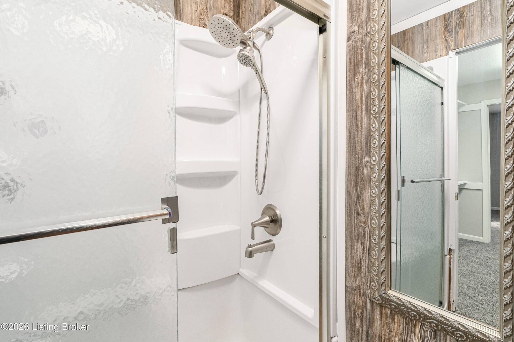 Walk-in shower with modern fixtures condo Louisville KY