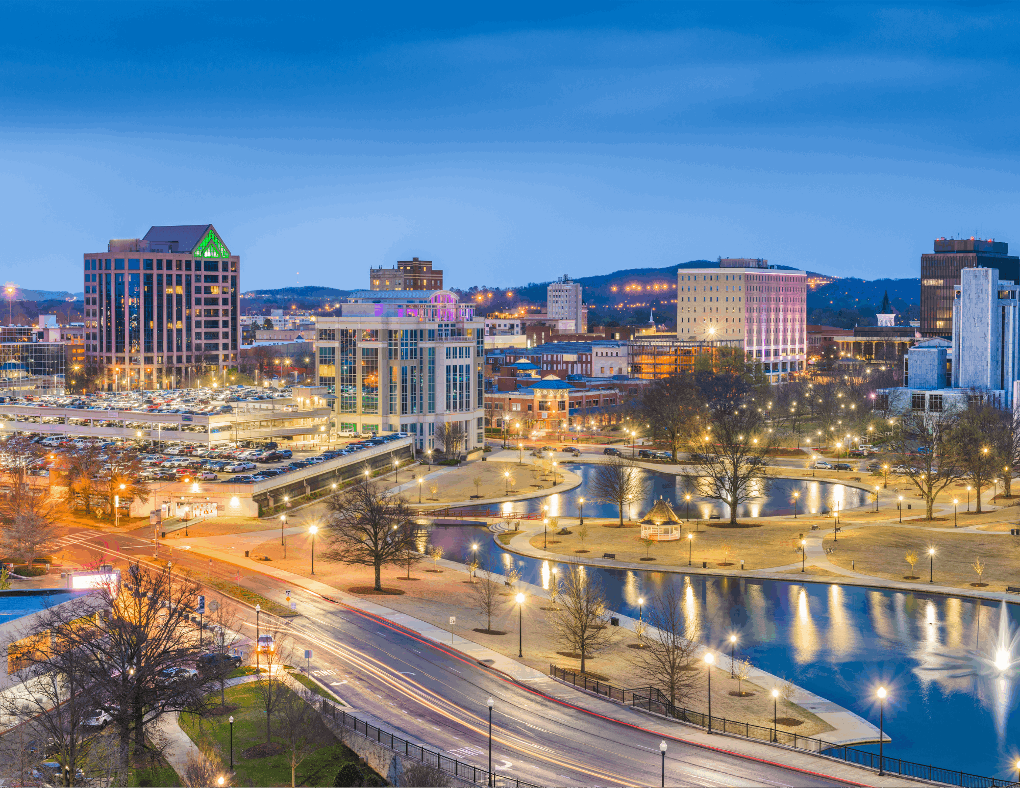 The downtown Huntsville, Alabama skyline at twilight, viewed from above.