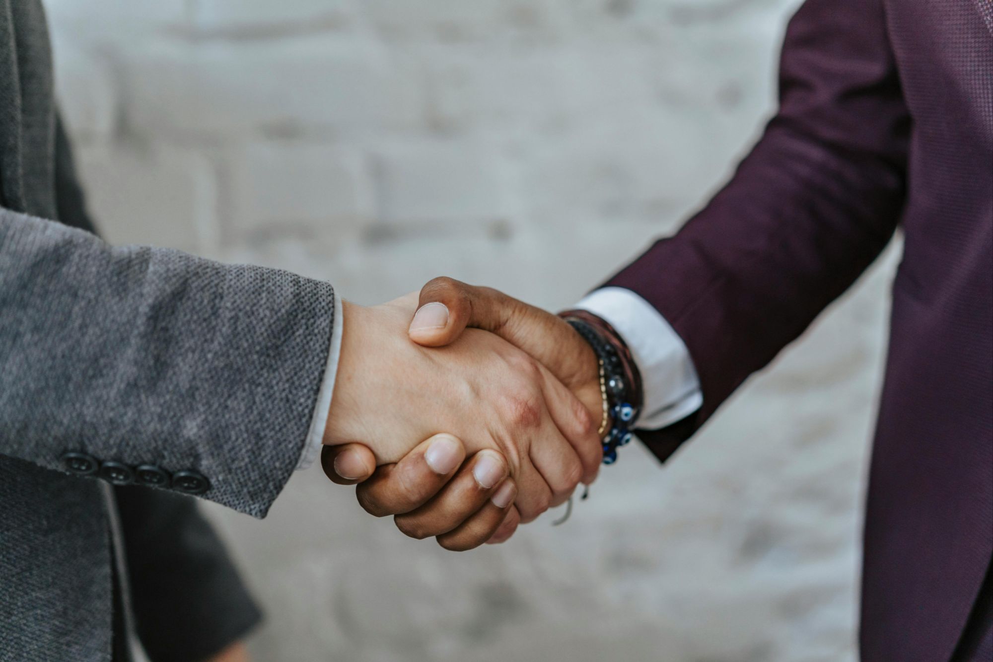 A close-up photo of a handshake