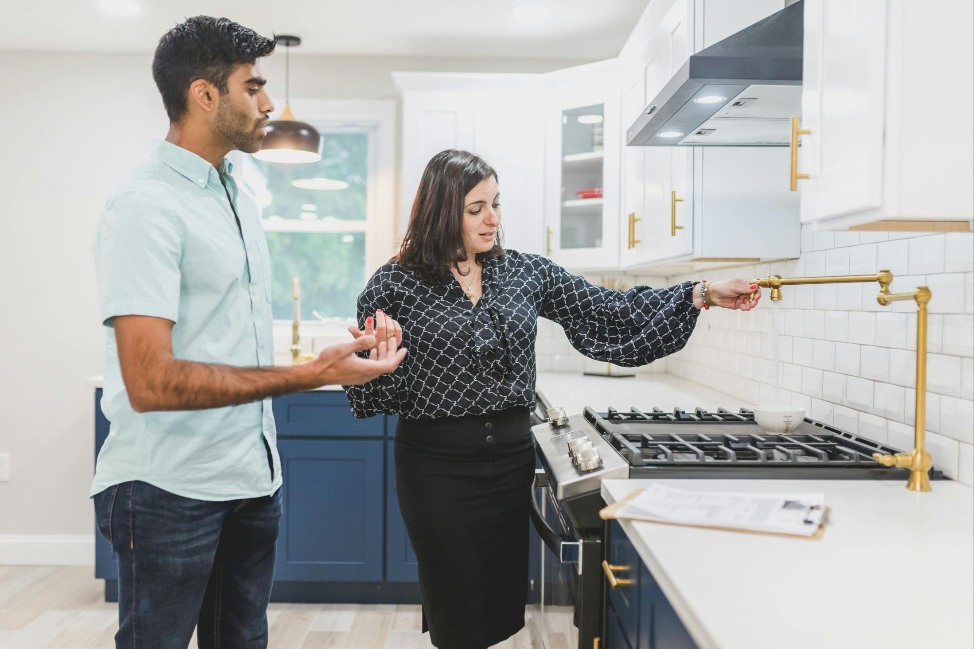 A real estate agent showing a house