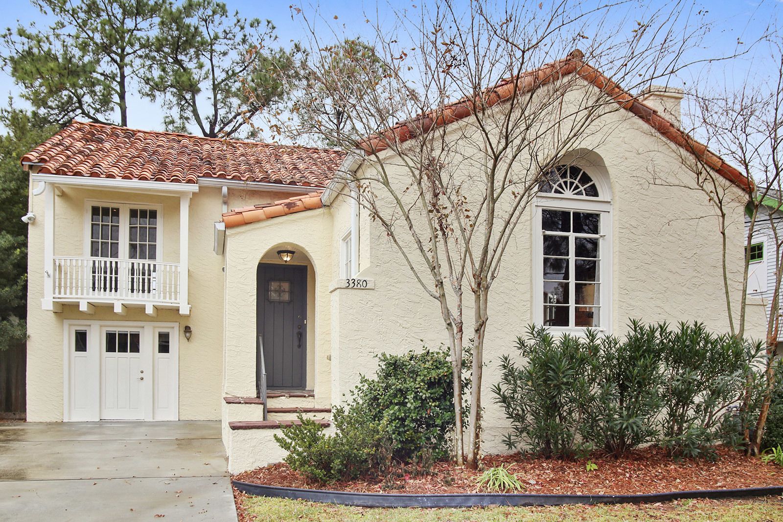Craftsman bungalow under live oaks in Broadmoor, New Orleans