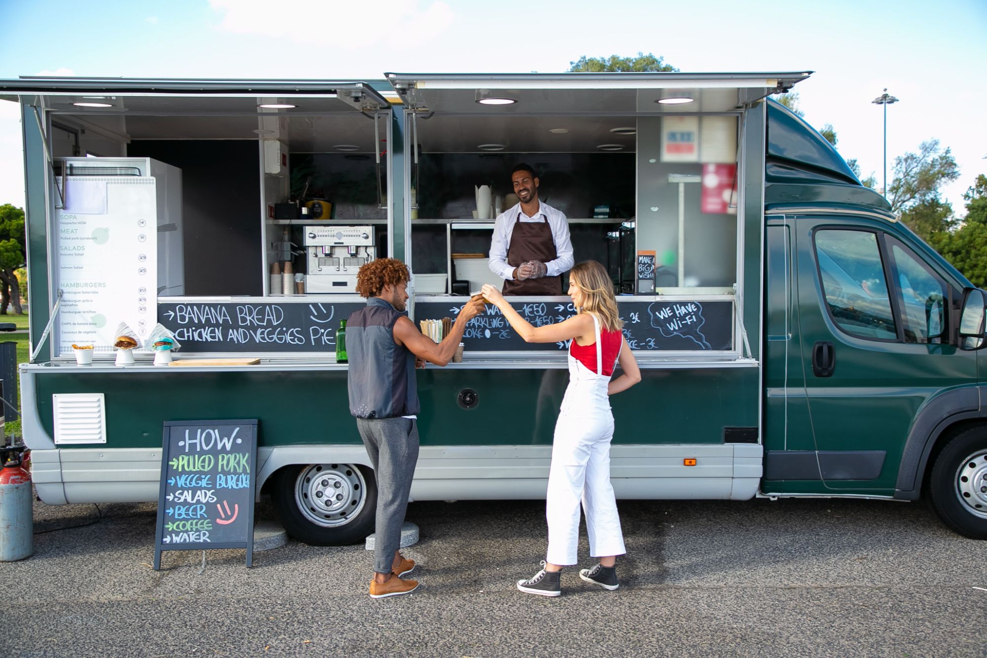  Two customers at a food truck.