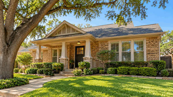Charming Brick Craftsman Home with Lush Landscaping Fort Worth