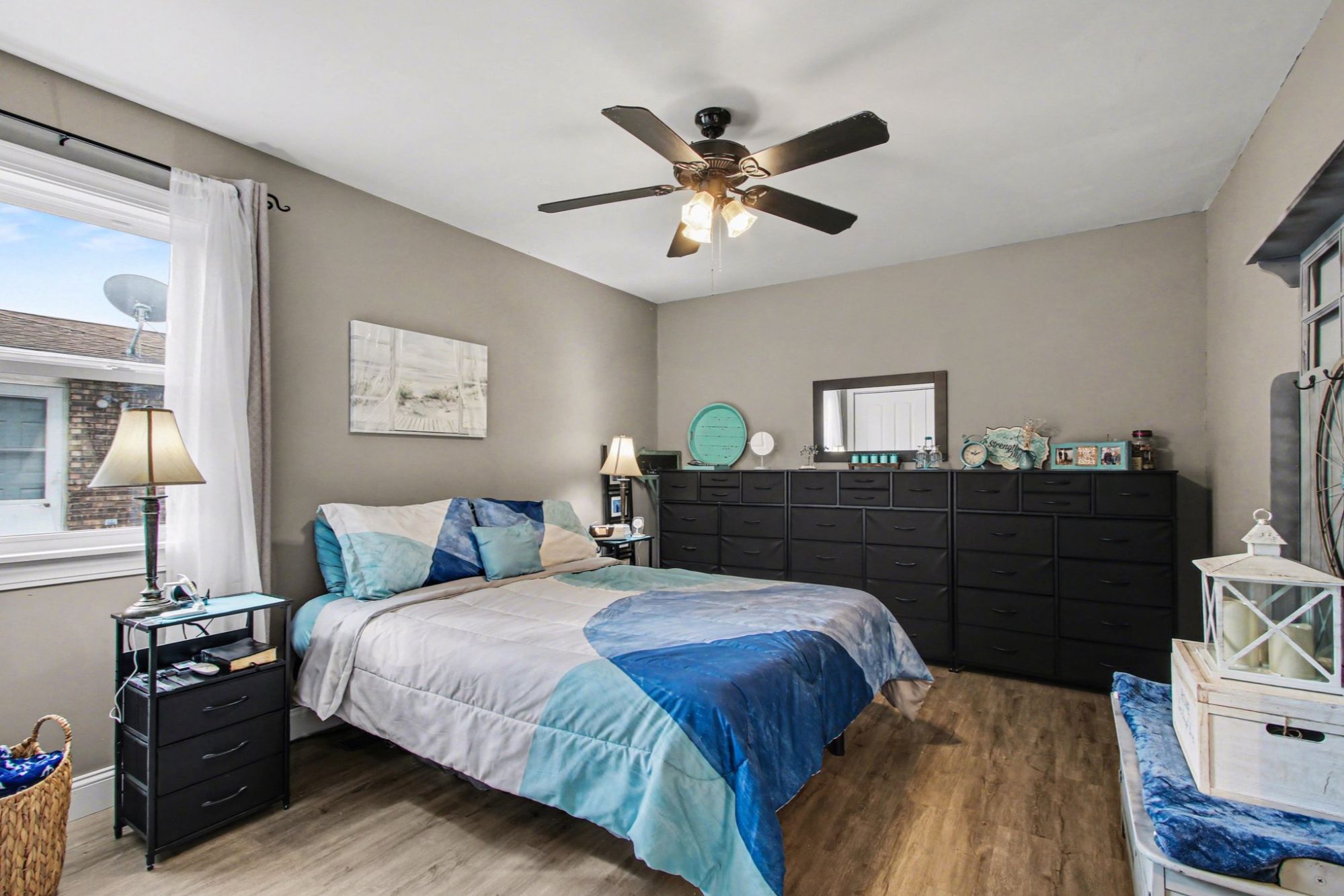 Spacious primary bedroom with private en suite bathroom in Portage Indiana ranch home