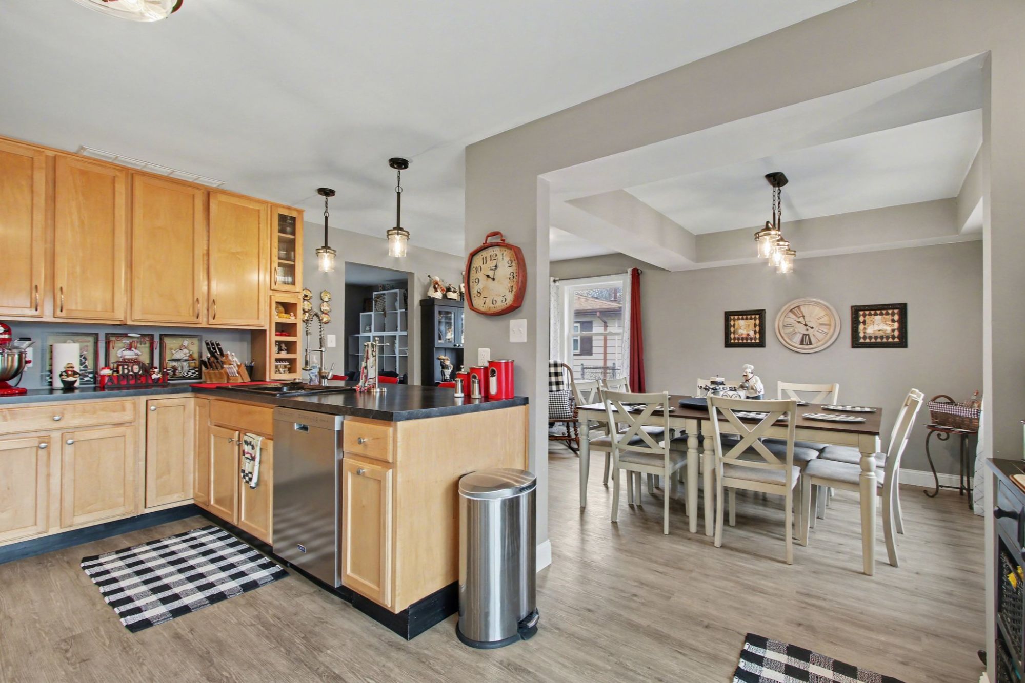 Updated kitchen with stainless steel appliances and peninsula at 3339 Ashland Ave Portage IN