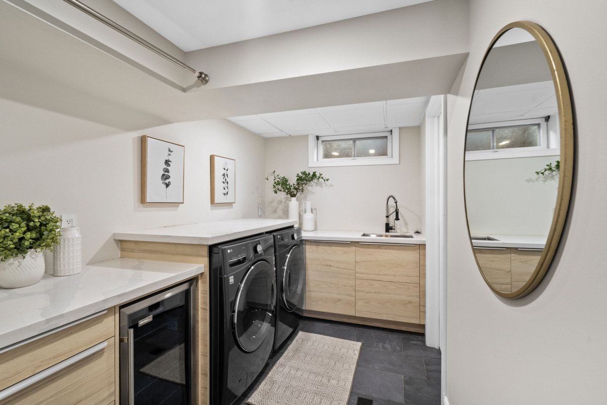 renovated laundry room with a washer and dryer considered chattels when buying a home